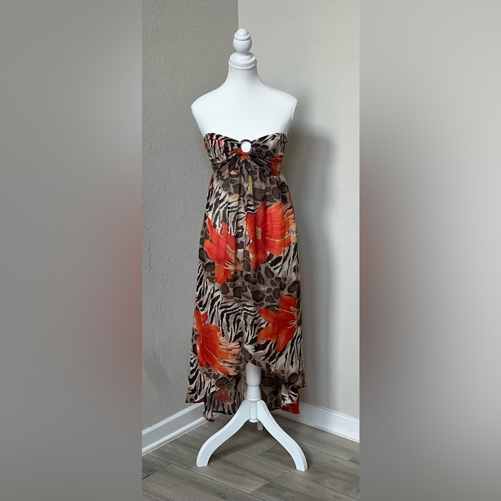 Beautiful sheer Safari inspired swim cover up.